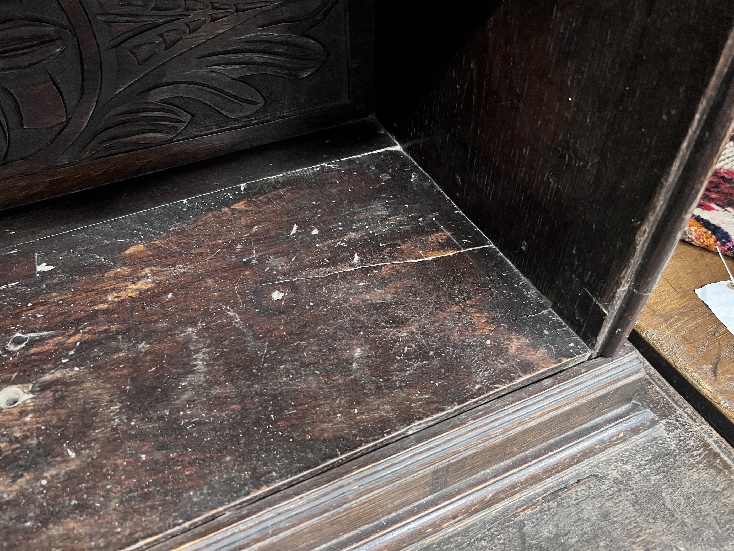 An 18th century style Flemish carved oak side cabinet, width 80cm, depth 62cm, height 165cm